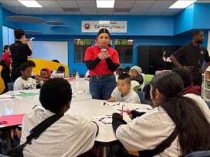 Center of Hope - Learning space with children and panda mascot
